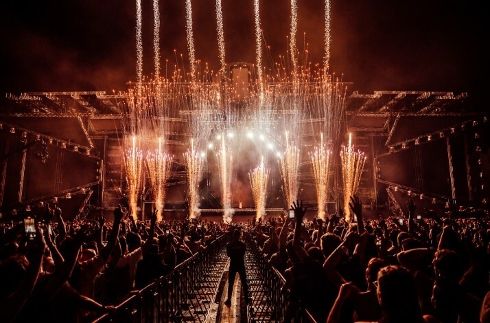 Large concert crowd with fireworks and bright stage lights at Ultra Europe in Split, Croatia.