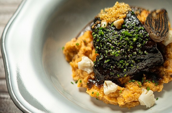 A special meal beautifully arranged on a plate and served at Michelin star restaurant BOCA