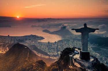 Dawn view of the Christ the Redeemer, statue of Jesus overlooking Rio de Janeiro Brazil.