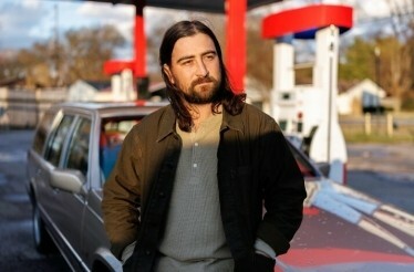 Promotional photo of music artist Noah Kahan