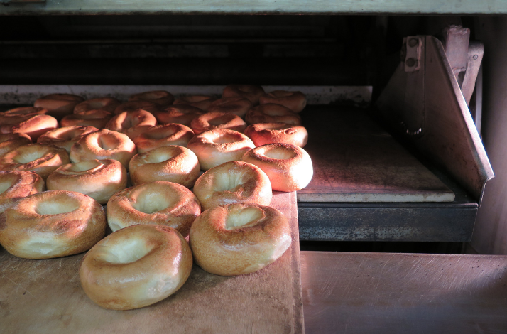 Baked bagels coming out of the oven at Russ & Daughters. 